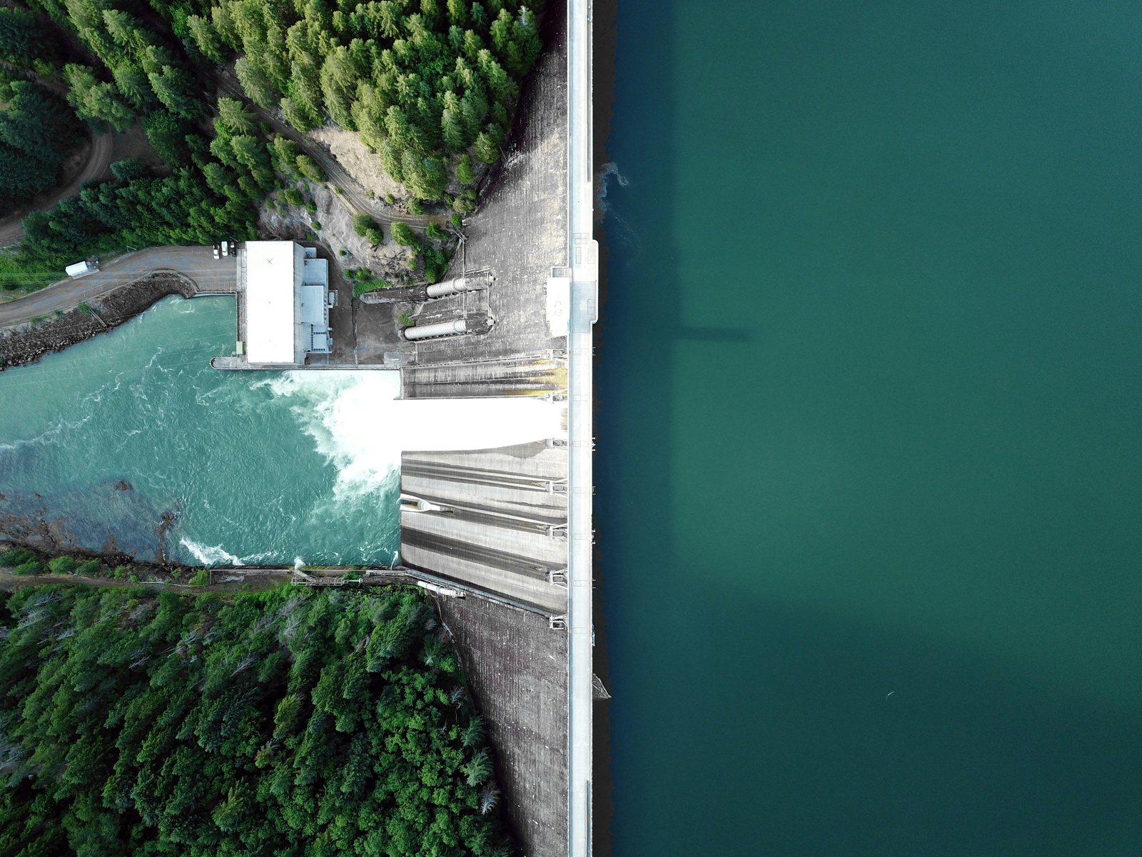 Aerial view of a hydroelectric dam and reservoir
