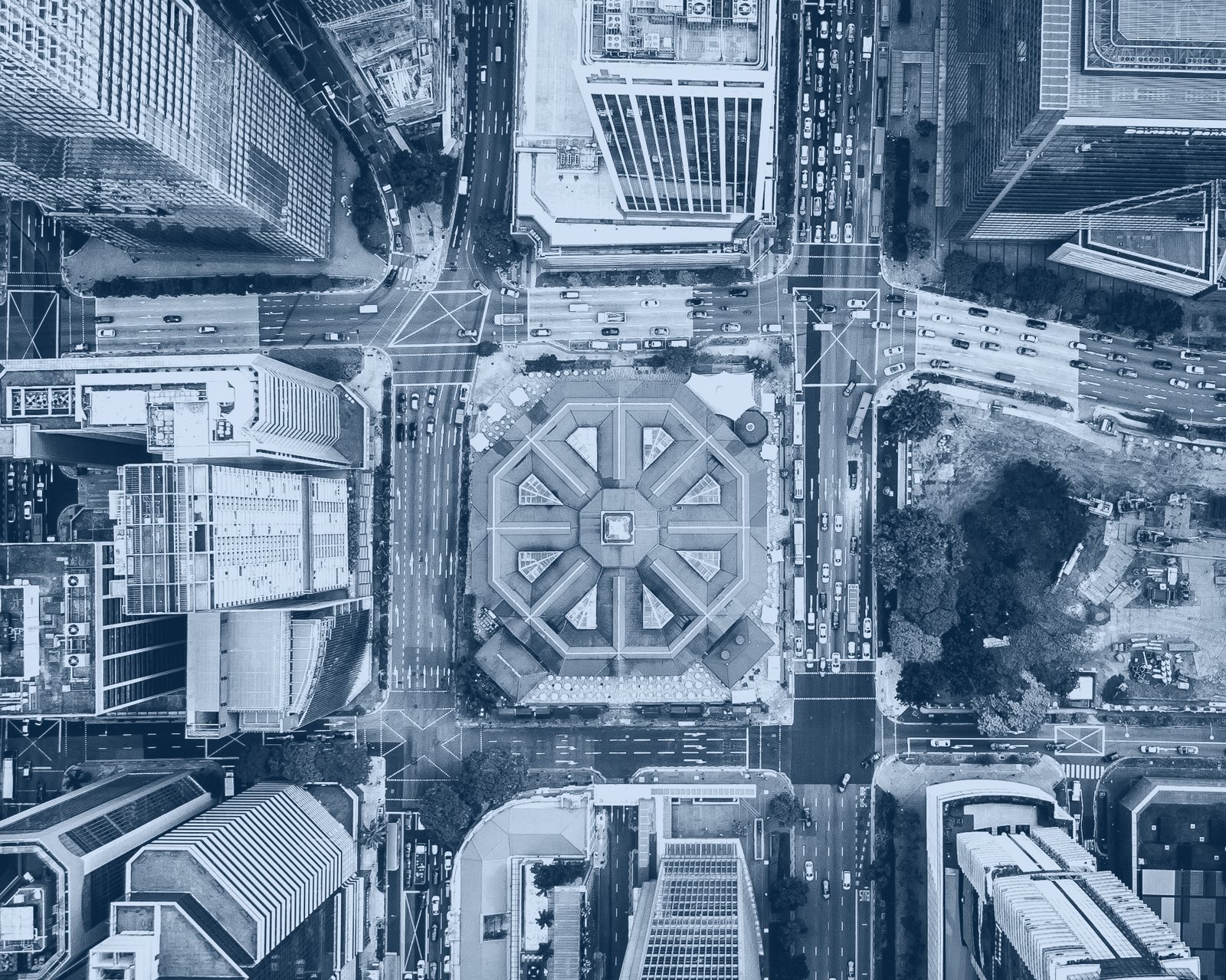 Aerial view of a city grid, roads meeting at intersections